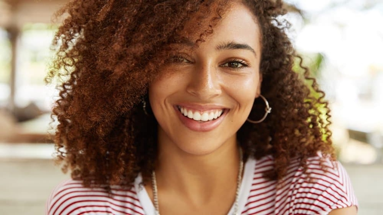 A simple smile can work a long way in giving you happiness