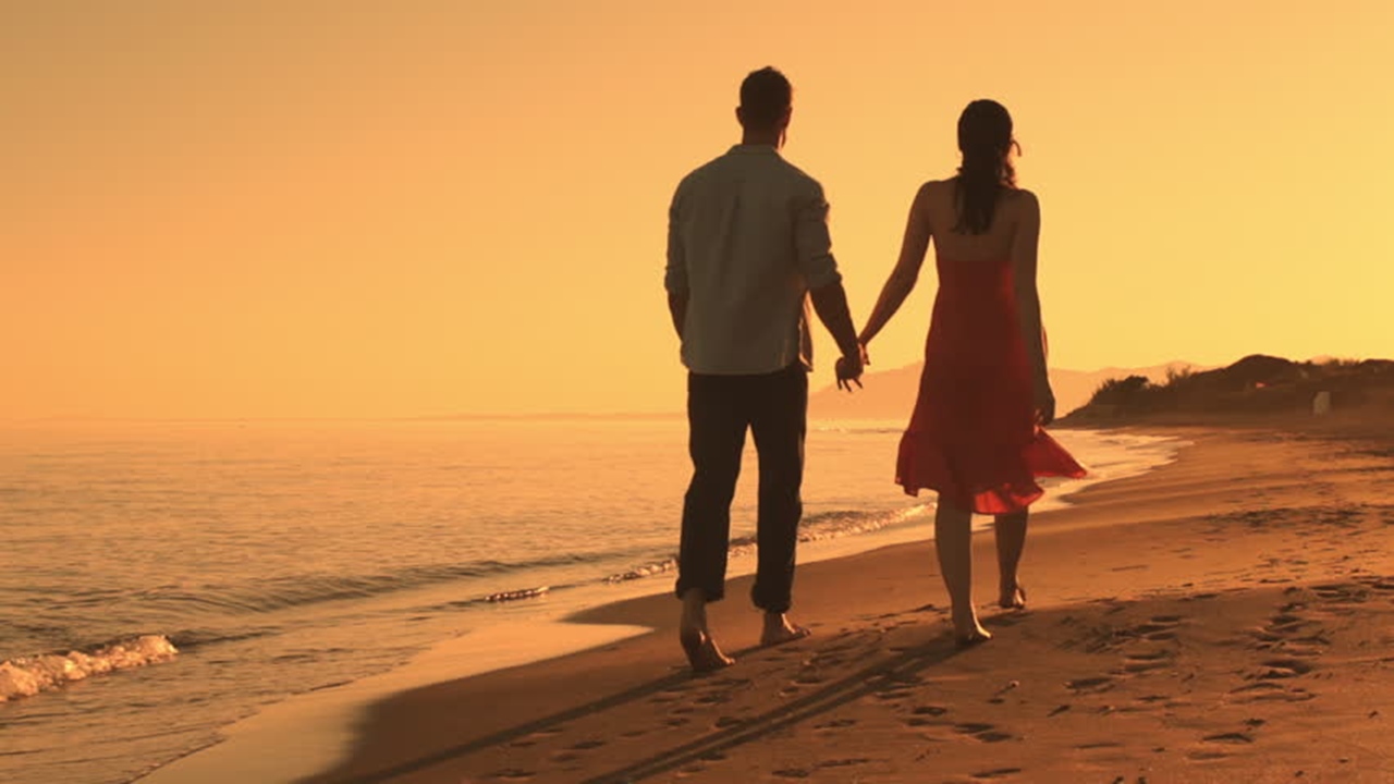 A walk on the beach while the sun sets is all you need for peace