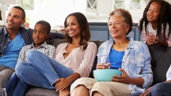 Watching TV shows with a group or alone? What brings more happiness
