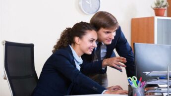 5 Signs A Female Colleague Likes You