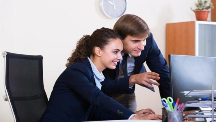 5 Signs A Female Colleague Likes You